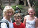 Panda cub greets Braden and Katie with Grandma